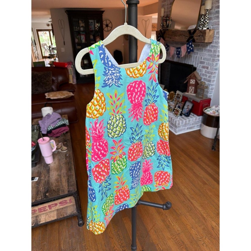 Tommy Bahama girl's sleeveless shift dress features a vibrant aqua blue cotton 6